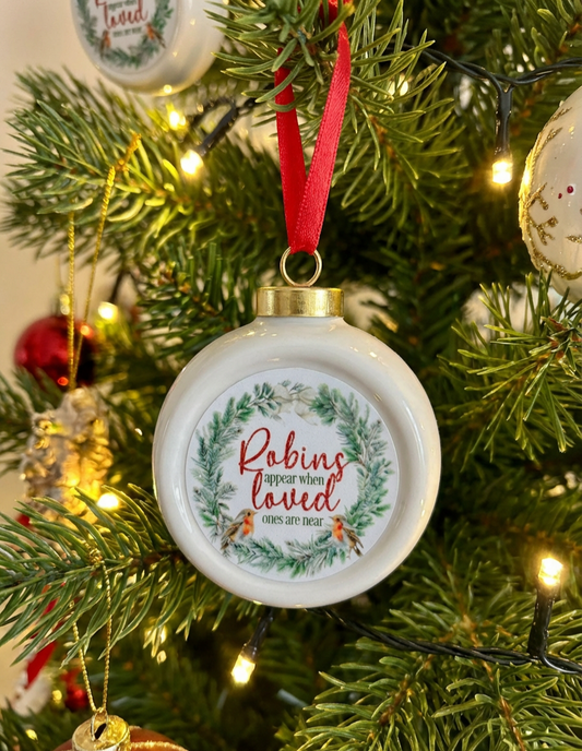 Robin appear remembrance Christmas decoration bauble
