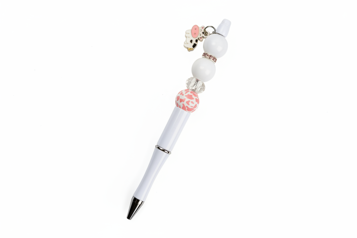 Beaded pen with hanging cow pendant